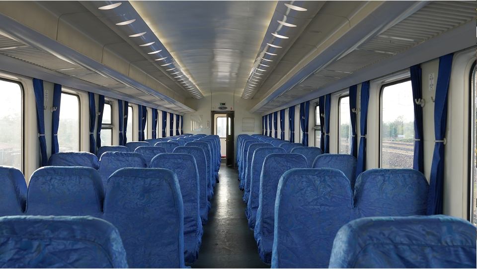 Hard-seat carriage on a conventional Chinese train with upright 3 plus 2 bench seating
