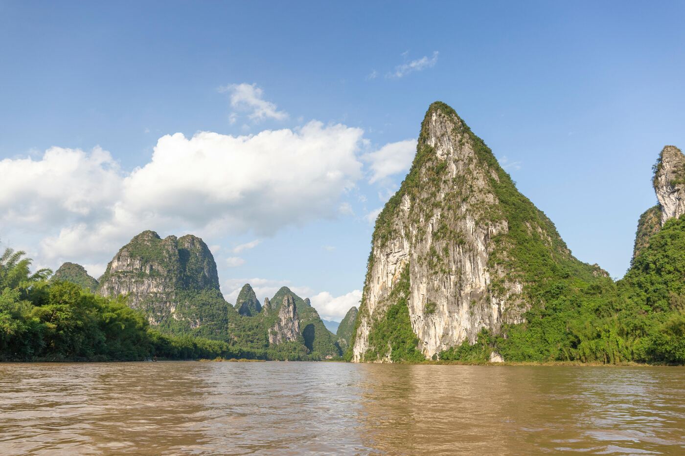 The Li River winding between limestone karst peaks between Guilin and Yangshuo — the landscape printed on the back of the Chinese ¥20 note.