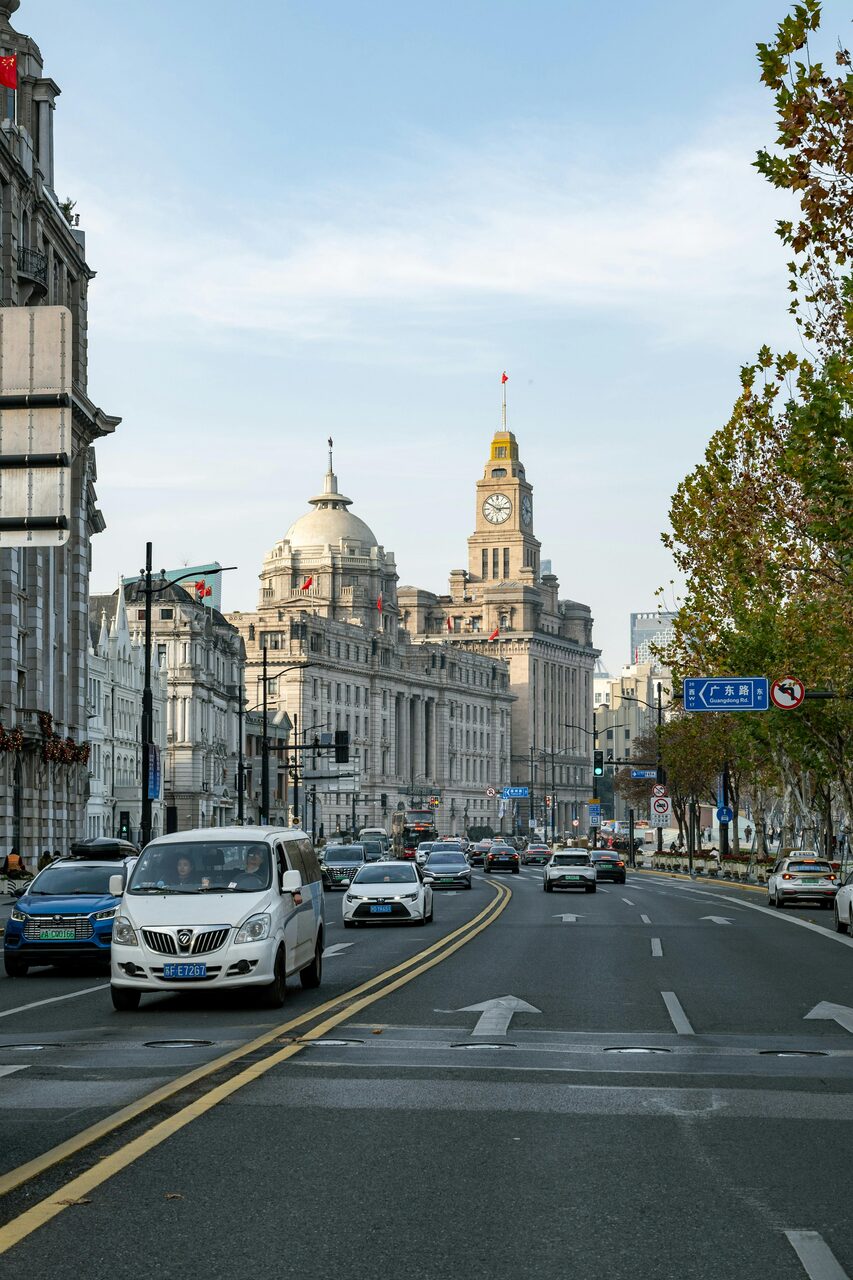 The Bund waterfront promenade with colonial-era buildings facing Pudong, Shanghai.