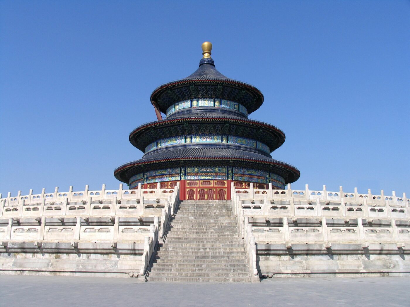 The triple-eaved, blue-tiled circular Hall of Prayer for Good Harvests on its white marble terrace at the Temple of Heaven, Beijing.