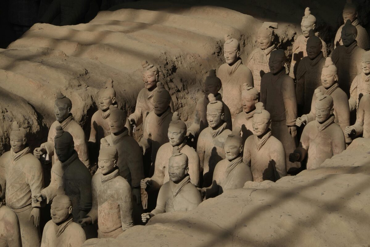 Rows of life-sized terracotta warriors standing in battle formation in Pit 1, Terracotta Army, Xi'an.