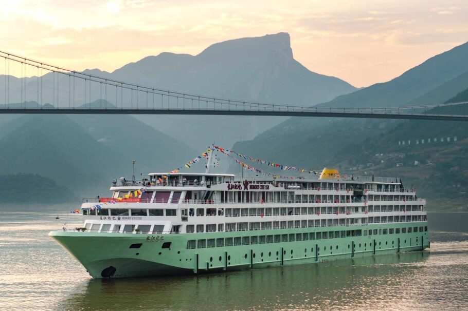 Yangtze River cruise ship deck with passengers enjoying the gorge scenery, Three Gorges, Chongqing.