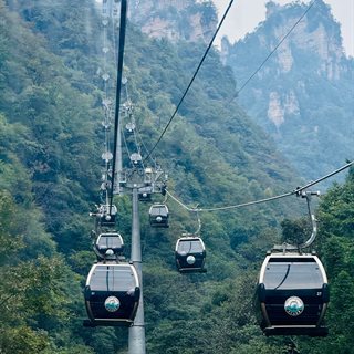 Tianzi Mountain cable car gondolas over the peak forest